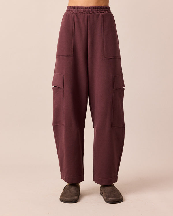 model wears jessie burgundy jersey trouesrs front