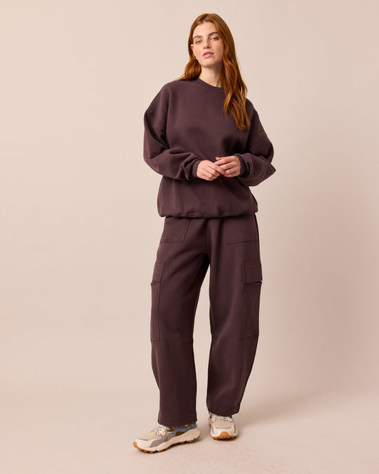 model wears jessie prune jersey trousers right