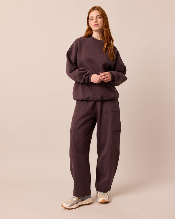 model wears jessie prune jersey trousers right