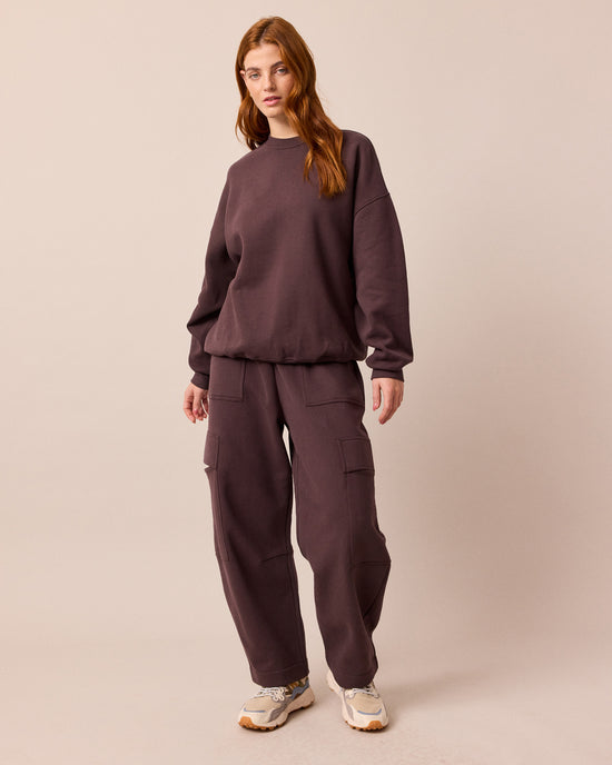 model wears jessie prune jersey trousers