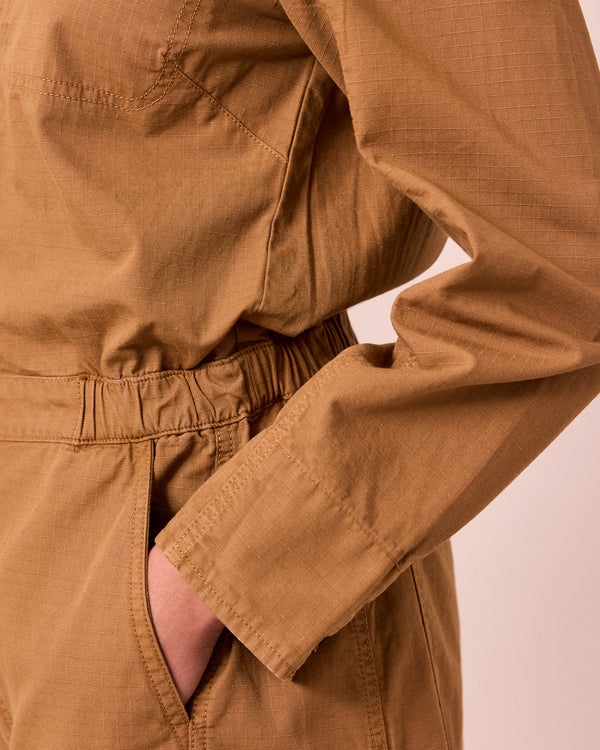 model wears jill nutmg textured cotton jumpsuit