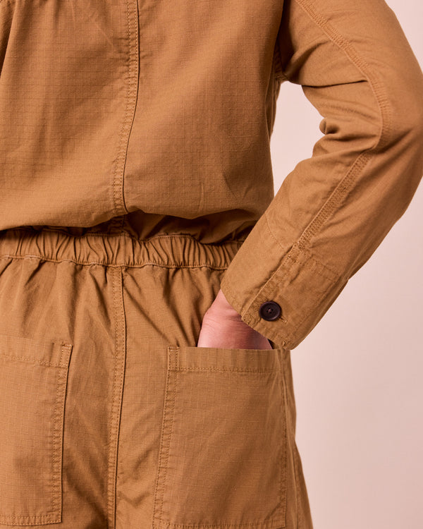 model wears jill nutmg textured cotton jumpsuit