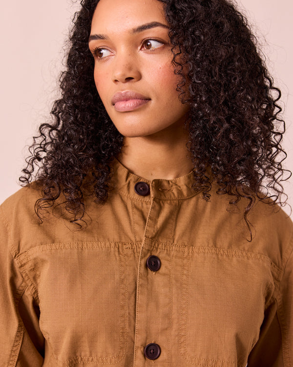 model wears jill nutmg textured cotton jumpsuit