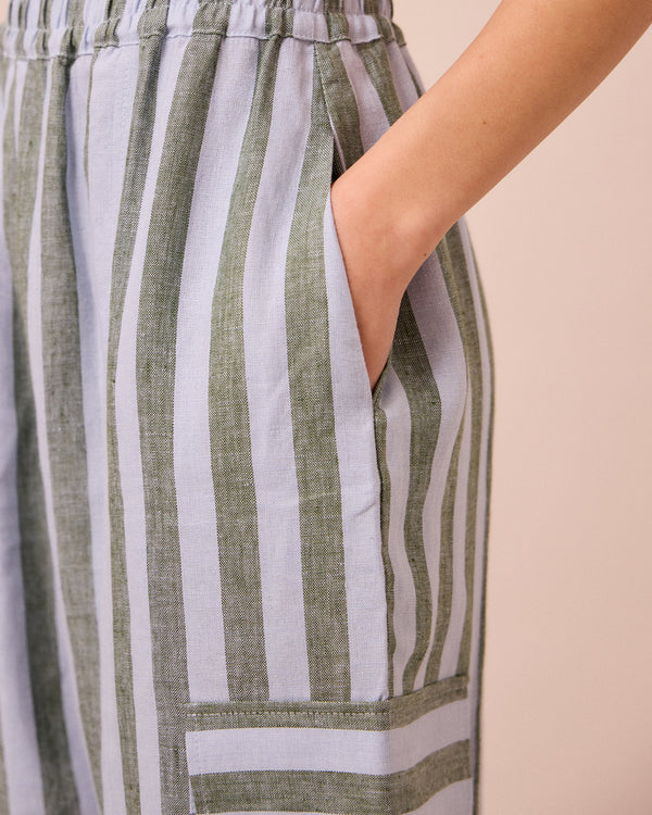 model wears jodi aloe stripe linen trousers