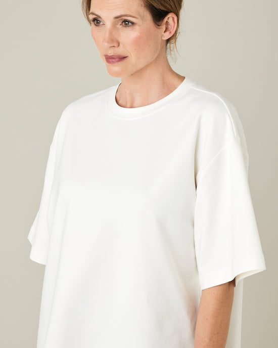 model wears off white jersey jude top