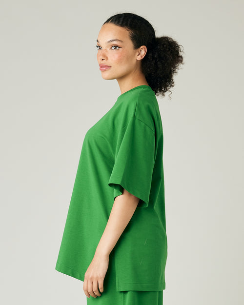 model wears juniper green jersey jude top