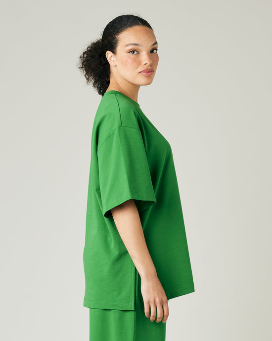 model wears juniper green jersey jude top