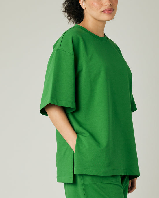 model wears juniper green jersey jude top