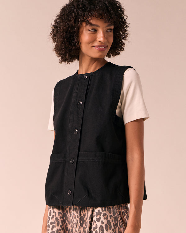 model wears kacie black denim top