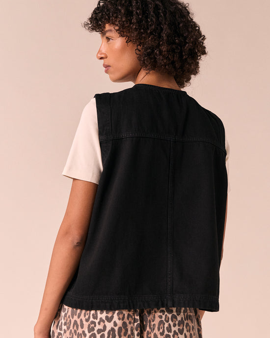 model wears kacie black denim top
