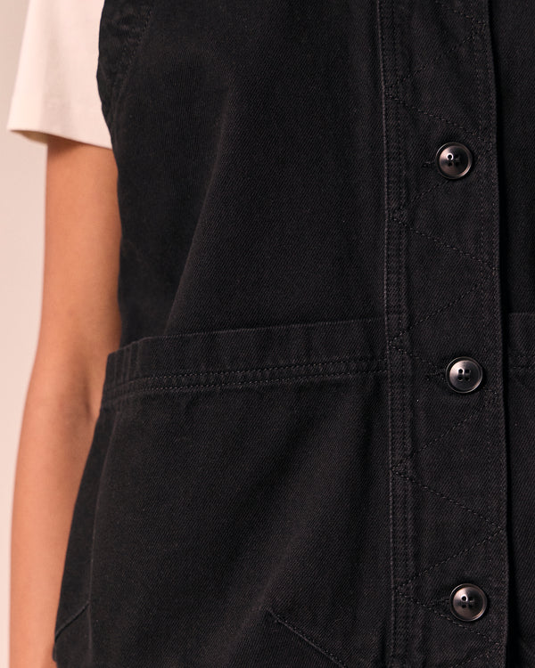 model wears kacie black denim top