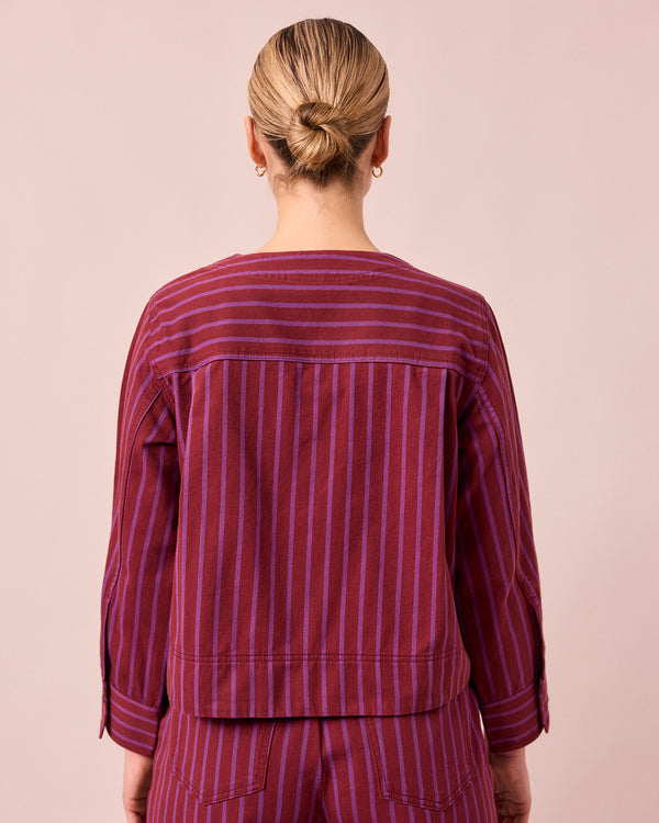 model wears kat russet and violet stripe denim jacket