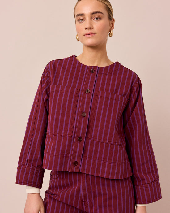 model wears kat russet and violet stripe denim jacket