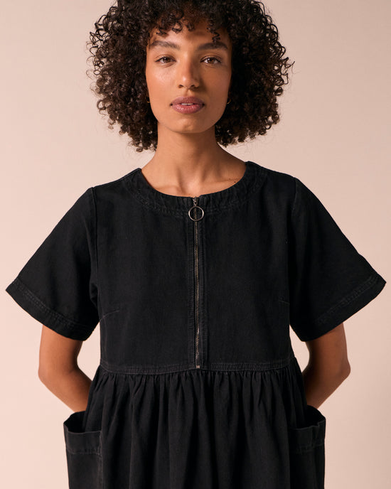 model wears kera black denim dress