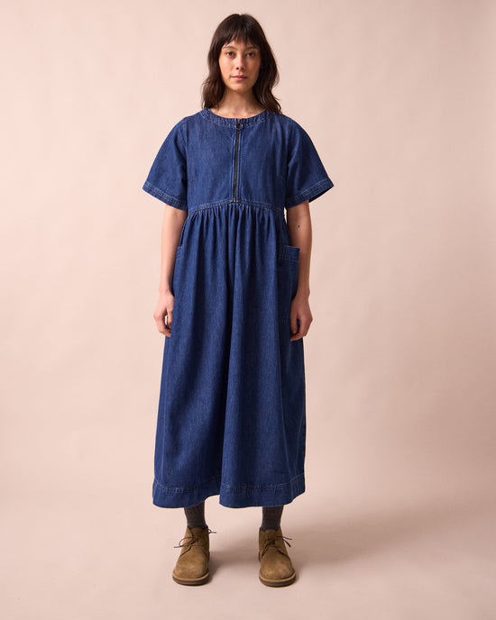 model wears kera mid blue denim dress