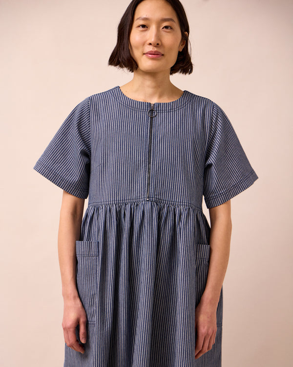 model wears kera navy hickory stripe denim dress