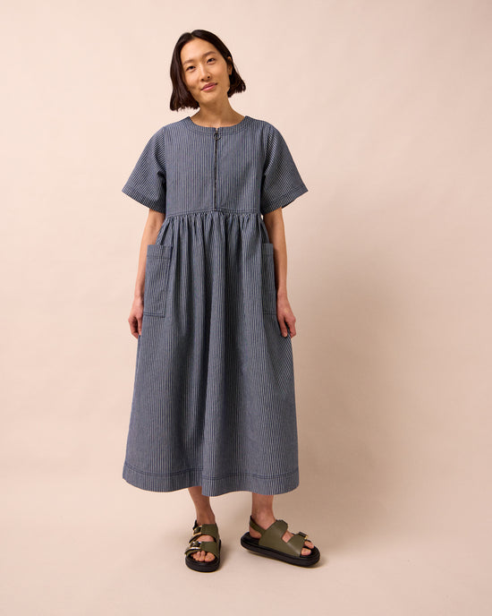 model wears kera navy hickory stripe denim dress