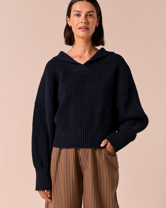model wears kia navy knitted jumper