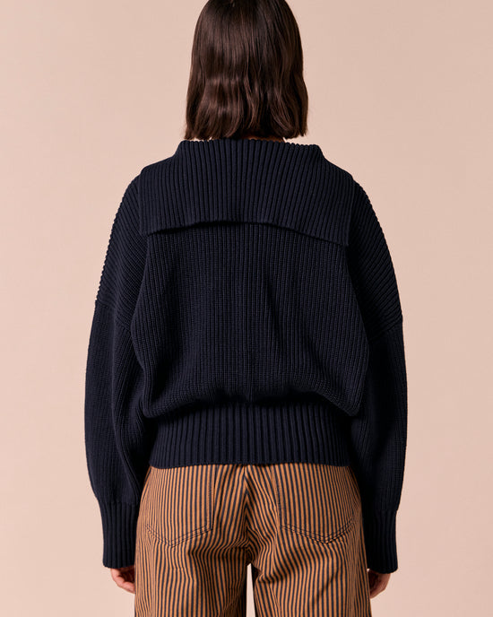 model wears kia navy knitted jumper