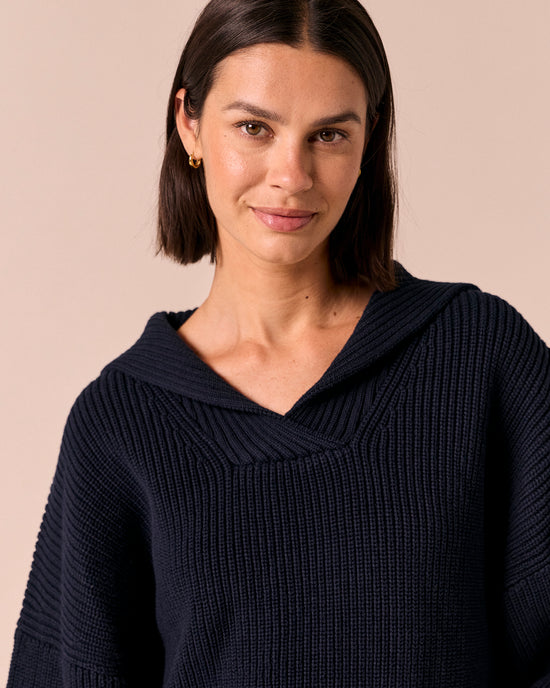 model wears kia navy knitted jumper
