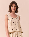 model wears kim bone spot linen top
