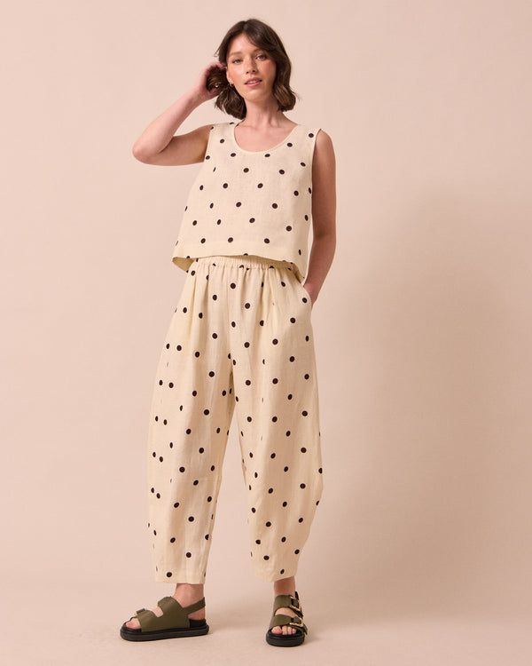 model wears kim bone spot linen top