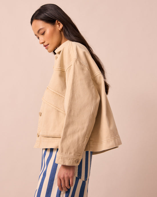 model wears kitty raffia denim jacket