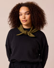 model wears olive knitted neckerchief