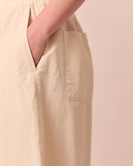 model wears layne bone cotton linen trousers