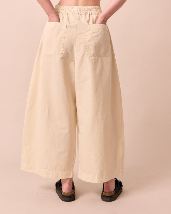 model wears layne bone cotton linen trousers back