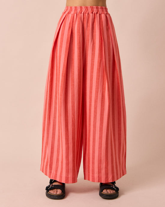 model wears layne sorbet stripe linen trousers front