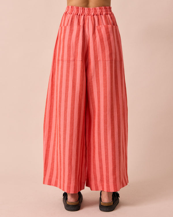 model wears layne sorbet stripe linen trousers back