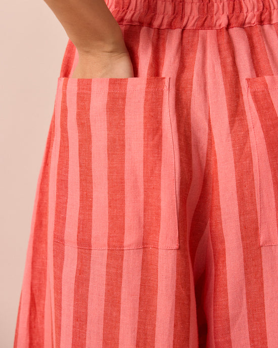 model wears layne sorbet stripe linen trousers