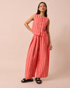 model wears layne sorbet stripe linen trousers right