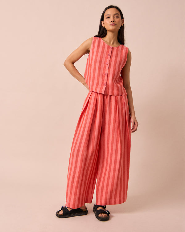 model wears layne sorbet stripe linen trousers right