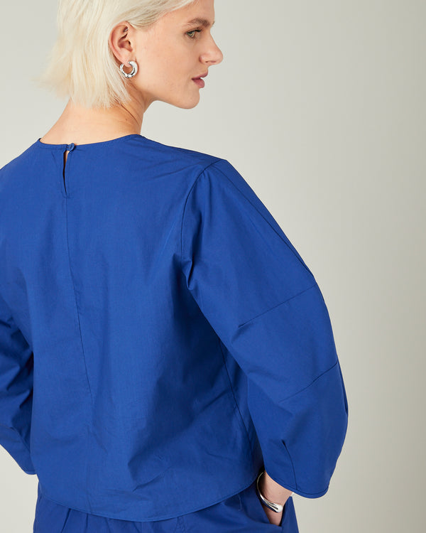 model wears cobalt poplin lena top