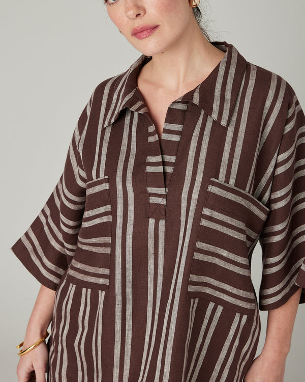 model wears coconut stripe cara linen shirt