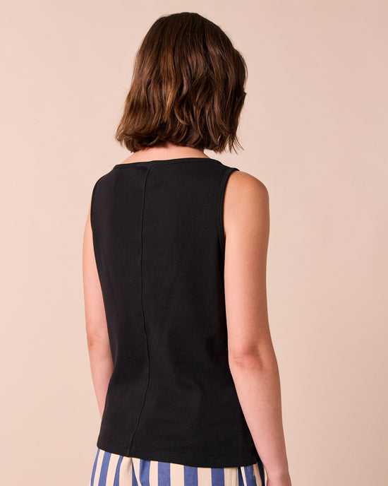 model wears liana black jersey top