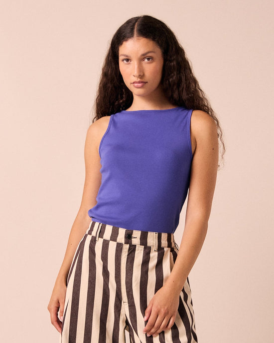 model wears liana cobalt blue jersey top