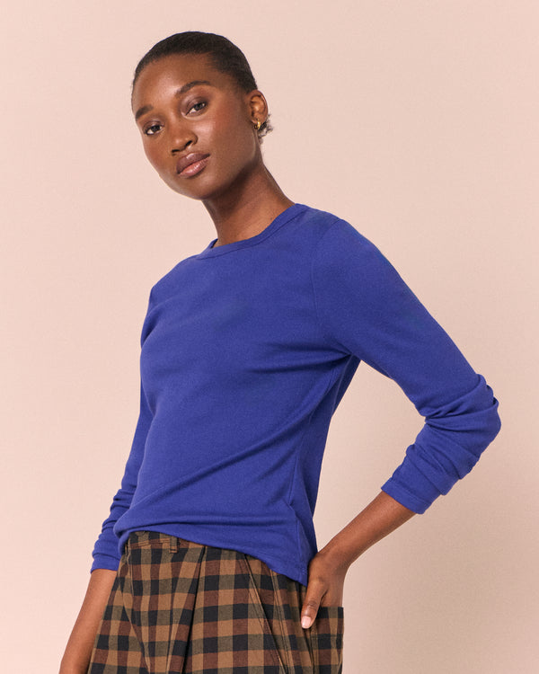 model wears lila klein blue jersey top