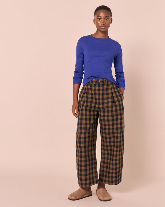 model wears lila klein blue jersey top
