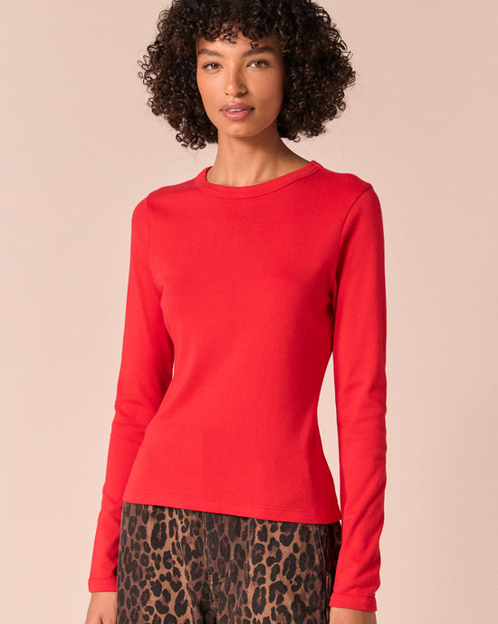 model wears lila poppy red jersey top