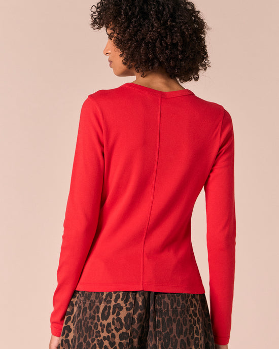 model wears lila poppy red jersey top