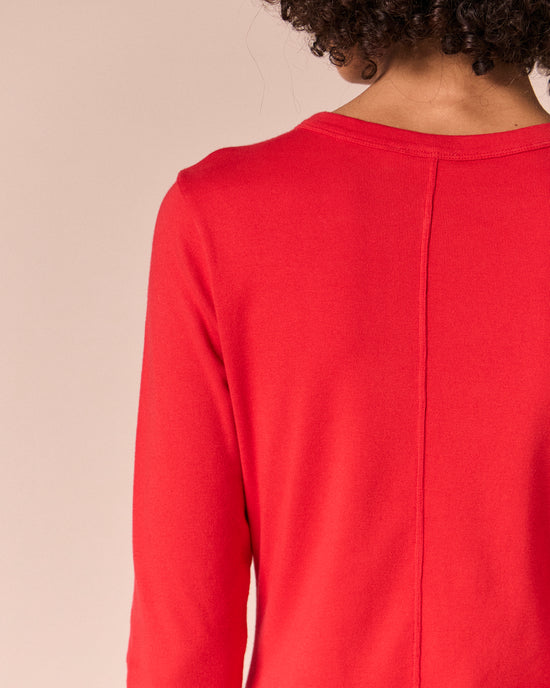 model wears lila poppy red jersey top