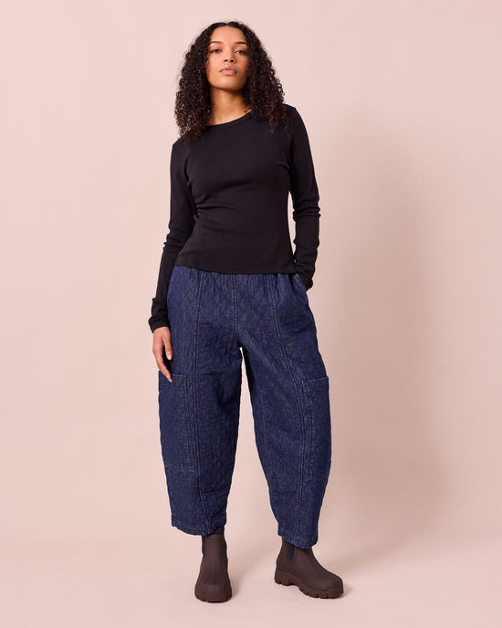 model wears lila true black jersey top