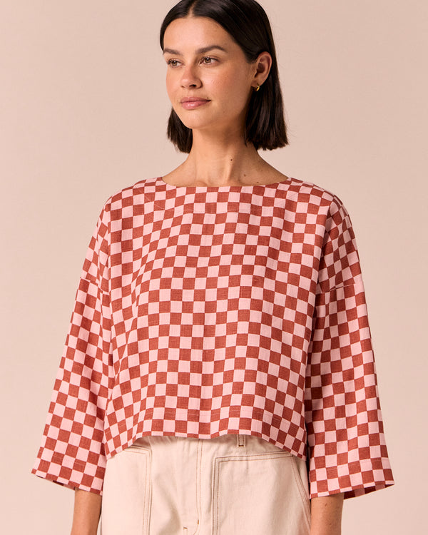 model wears lily rosewood checkerboard linen top