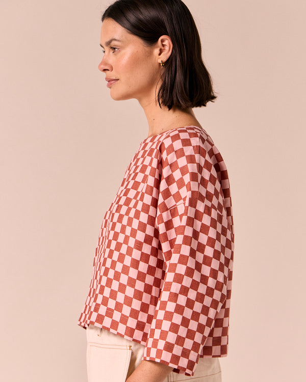 model wears lily rosewood checkerboard linen top