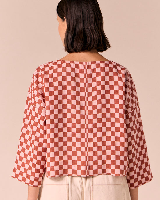 model wears lily rosewood checkerboard linen top