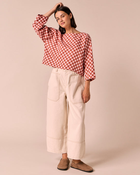 model wears lily rosewood checkerboard linen top