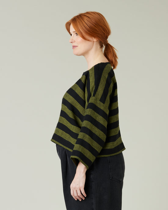 pregnant model wear olive and black stripe linen lily top